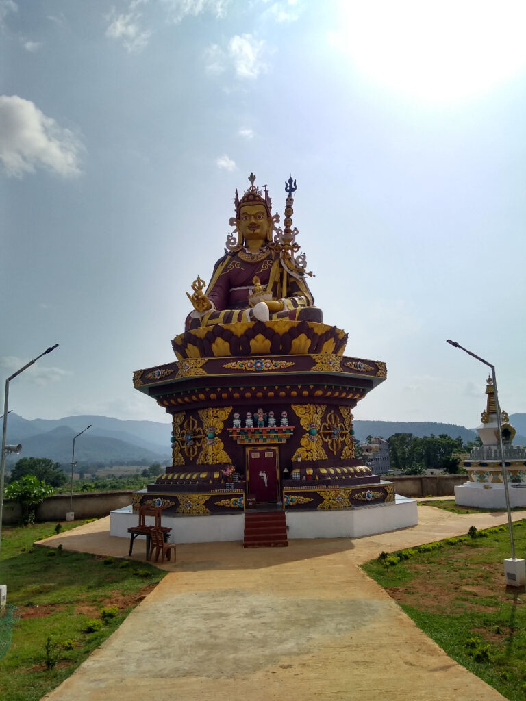 Golden statue inside Padmasambhava monastery in Chandragiri Odisha